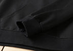 Black jogger cuff with stitched fabric seam detail