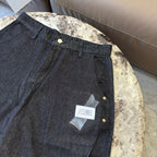 Dark denim shorts with front patch pocket and buttoned waist closure