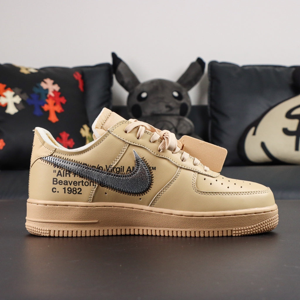 Cream Air Force 1 low-top sneakers with blue Nike swoosh and lace-up detail