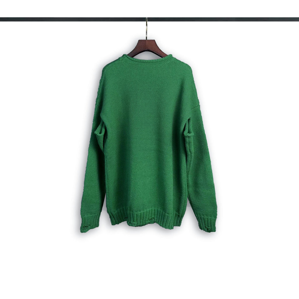 Green crewneck sweatshirt with long sleeves and ribbed cuffs and hem