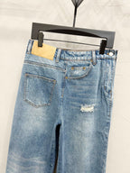 Light blue denim jeans with front patch pockets and belt loops
