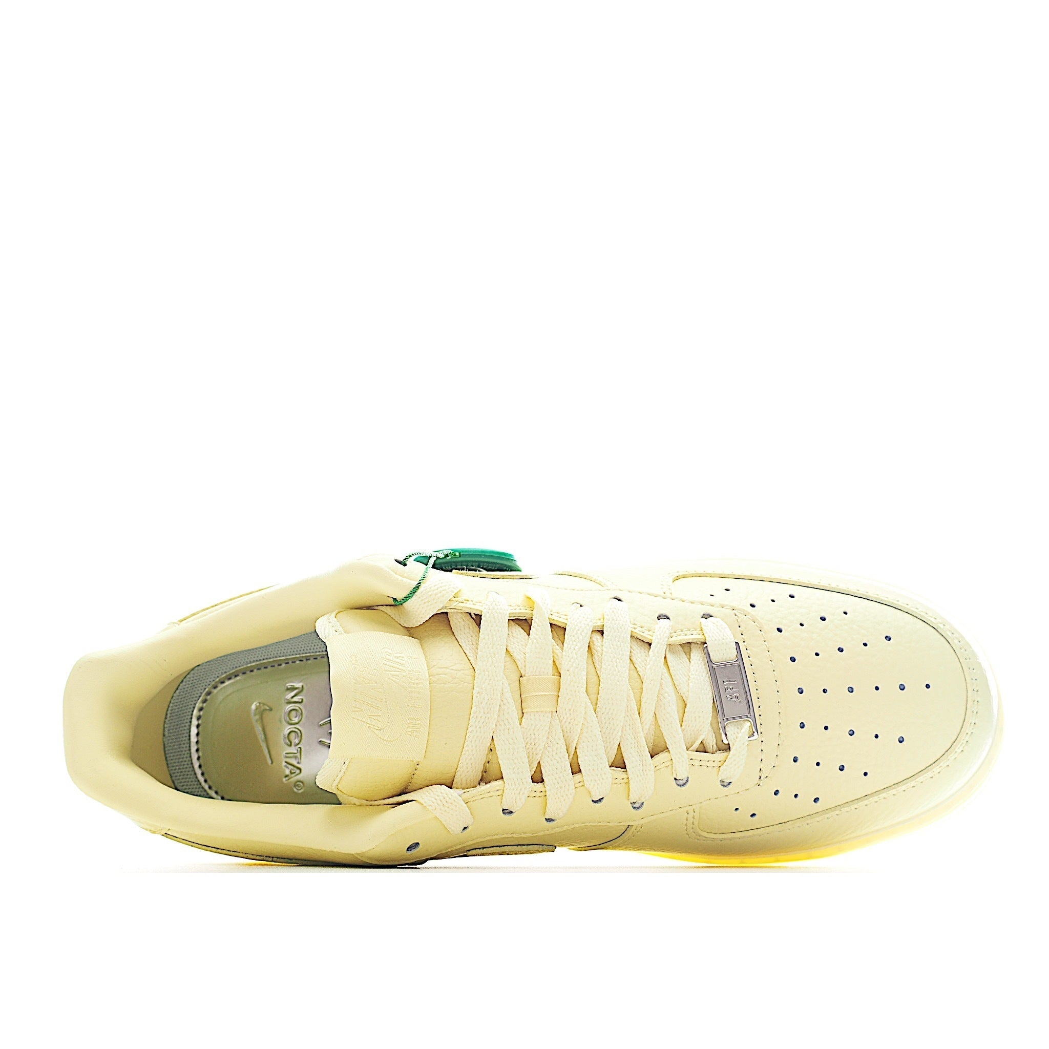 Air Force 1 low-top sneaker in pale yellow leather, lace-up side view with interior lining