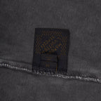 Dark shorts waistband area with Louis Vuitton interior label