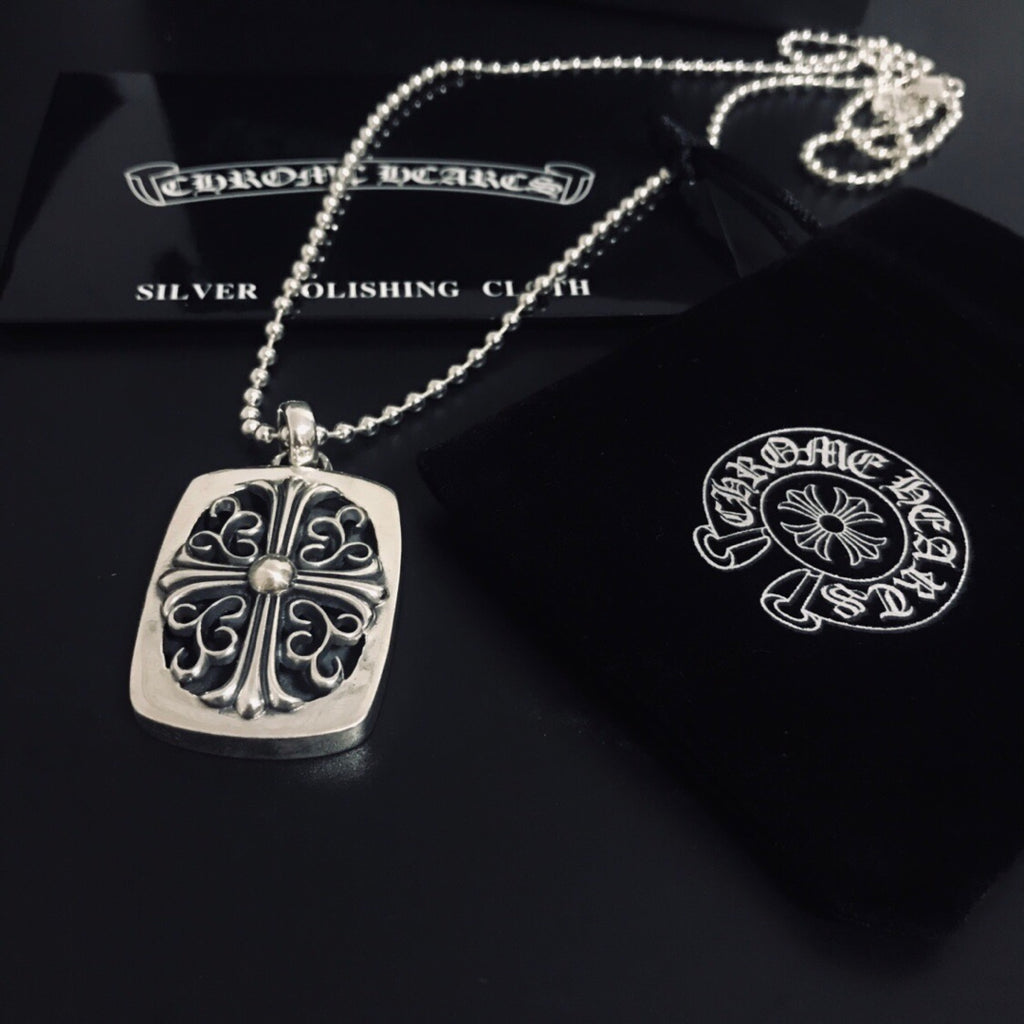 Silver pendant necklace with square filigree charm and matching round charm