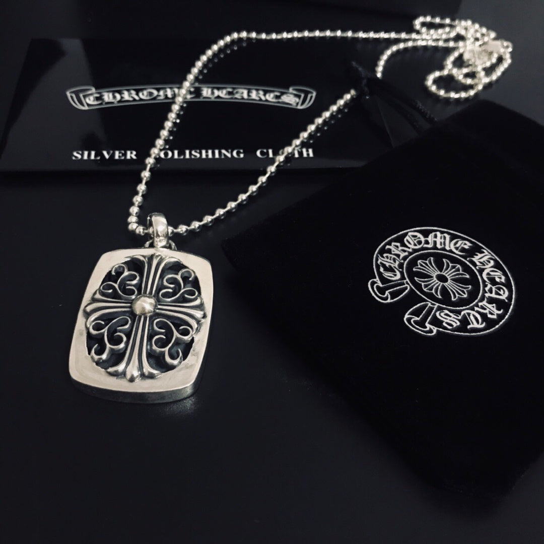 Silver pendant necklace with square filigree charm and matching round charm