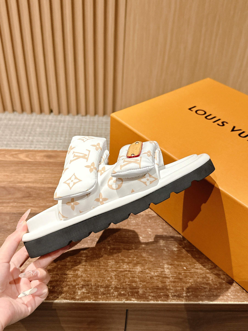 Louis Vuitton monogram slide sandals, white upper with tan leather patch and black sole