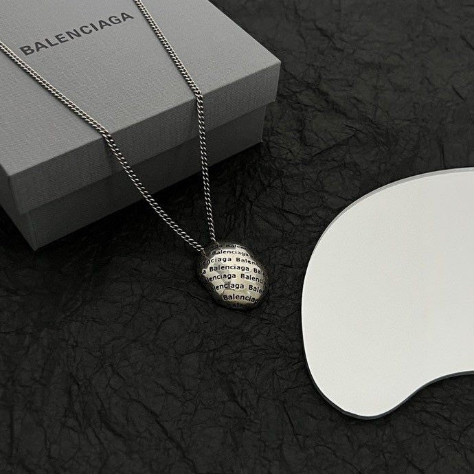 Round logo pendant necklace with silver-tone chain and gift box