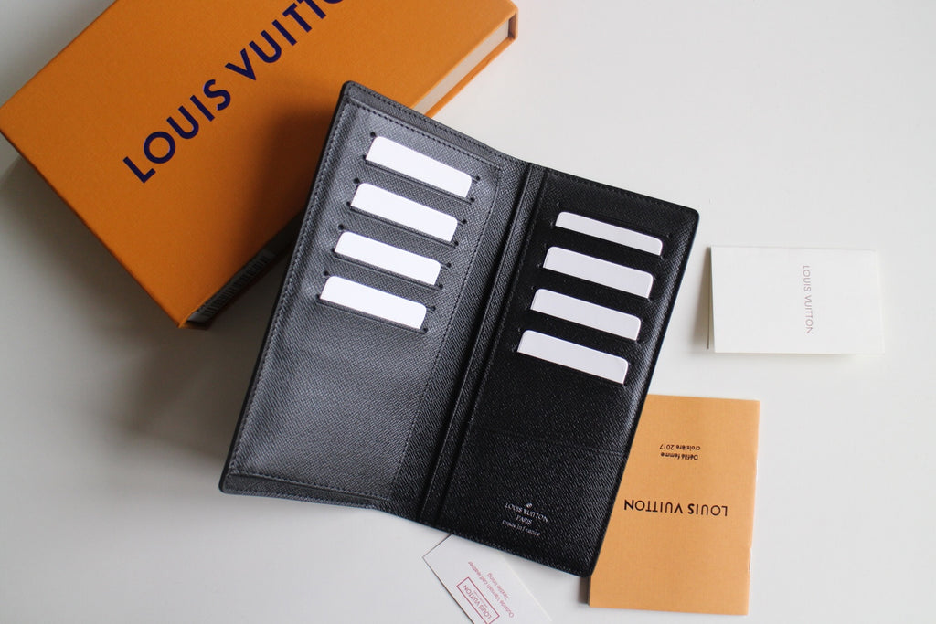 Louis Vuitton small wallet open, black leather with multiple card slots