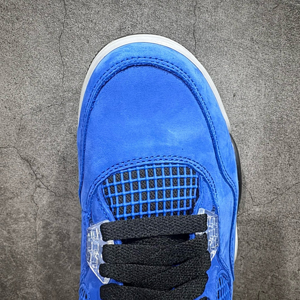 Air Jordan 4 sneaker toe in blue suede with clear mesh vent and black strap detail