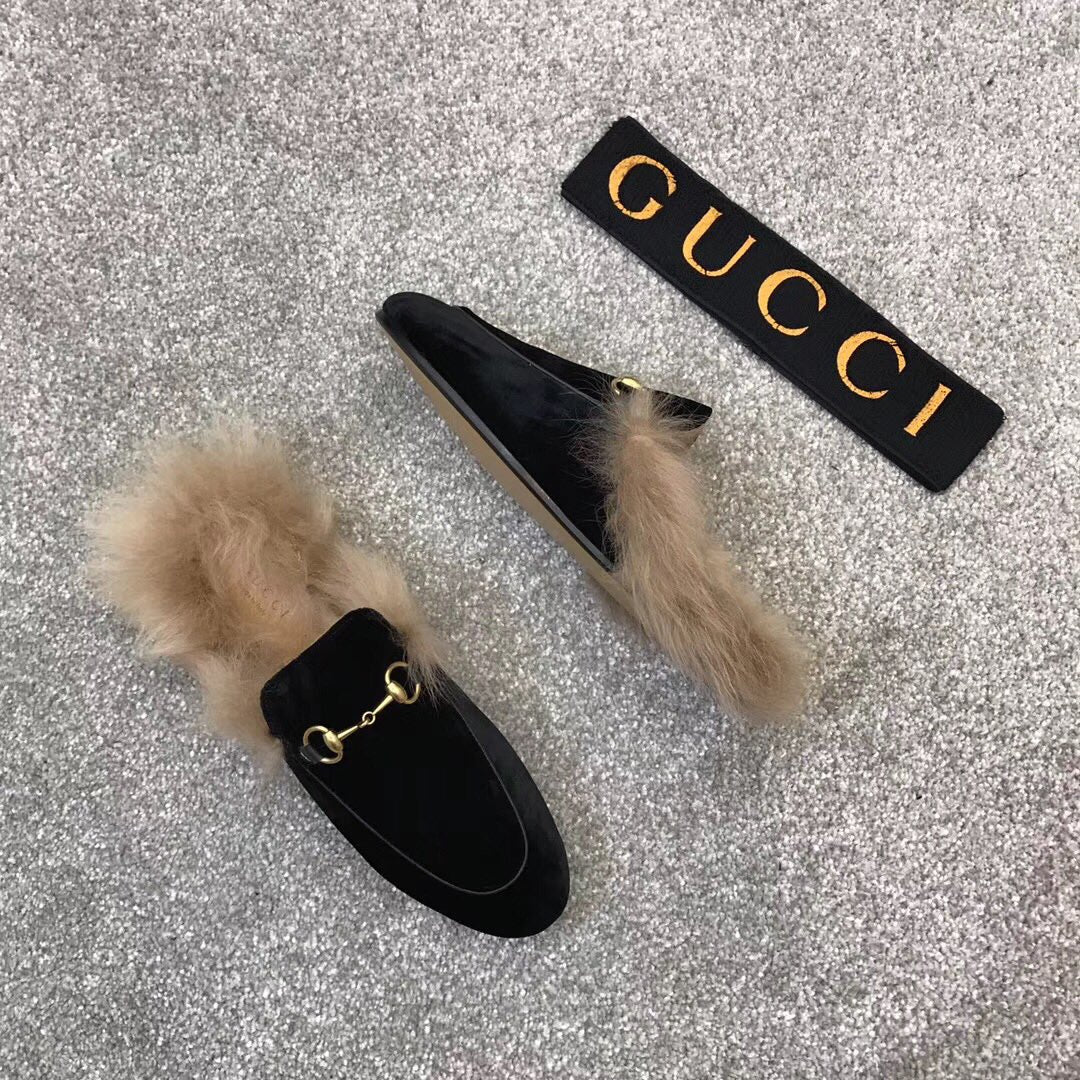 Black velvet loafer slides with beige faux fur cuff and gold-tone ring detail