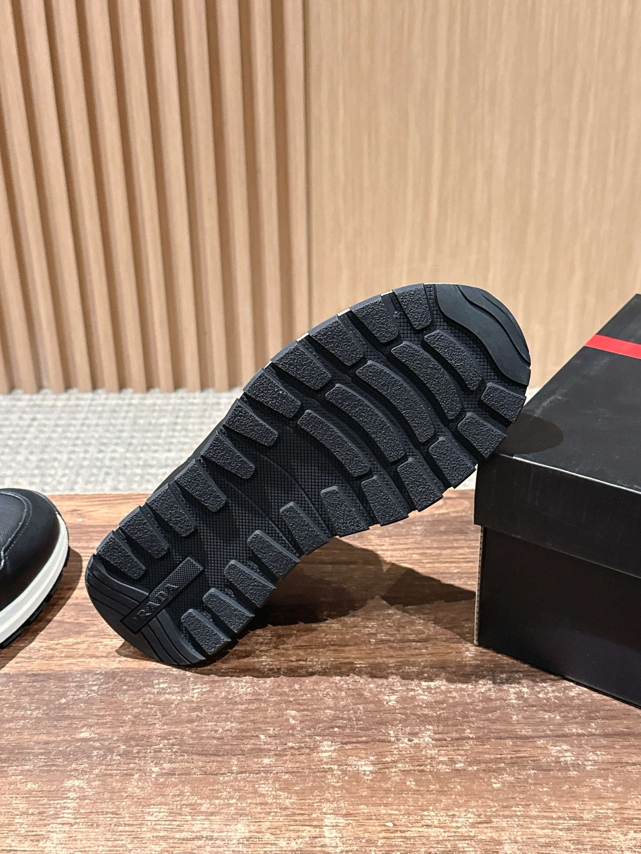 Prada unisex sneakers outsole, black tread pattern on white sole