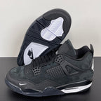 Air Jordan 4 sneakers with dark rubber outsole tread and white Jordan wing logo