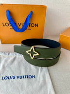 Green leather belt with silver star buckle, laid on white cloth