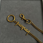 Balenciaga gold logo keychain necklace with circular ring and hook clasp