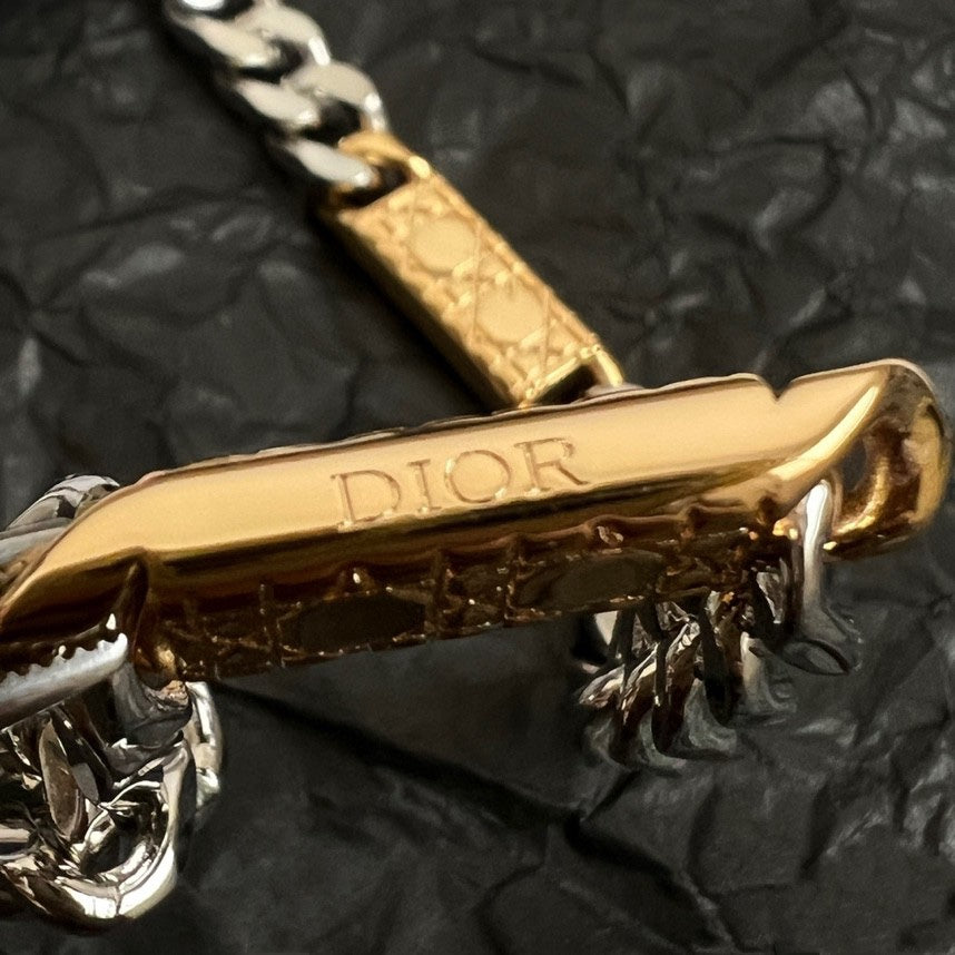 Dior necklace clasp and logo bar, gold-tone plate with silver chain links