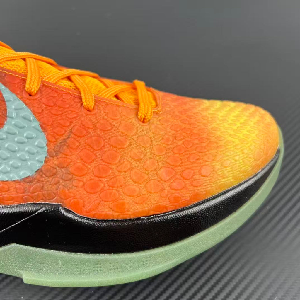 Basketball shoe upper in orange-to-yellow gradient with textured pattern