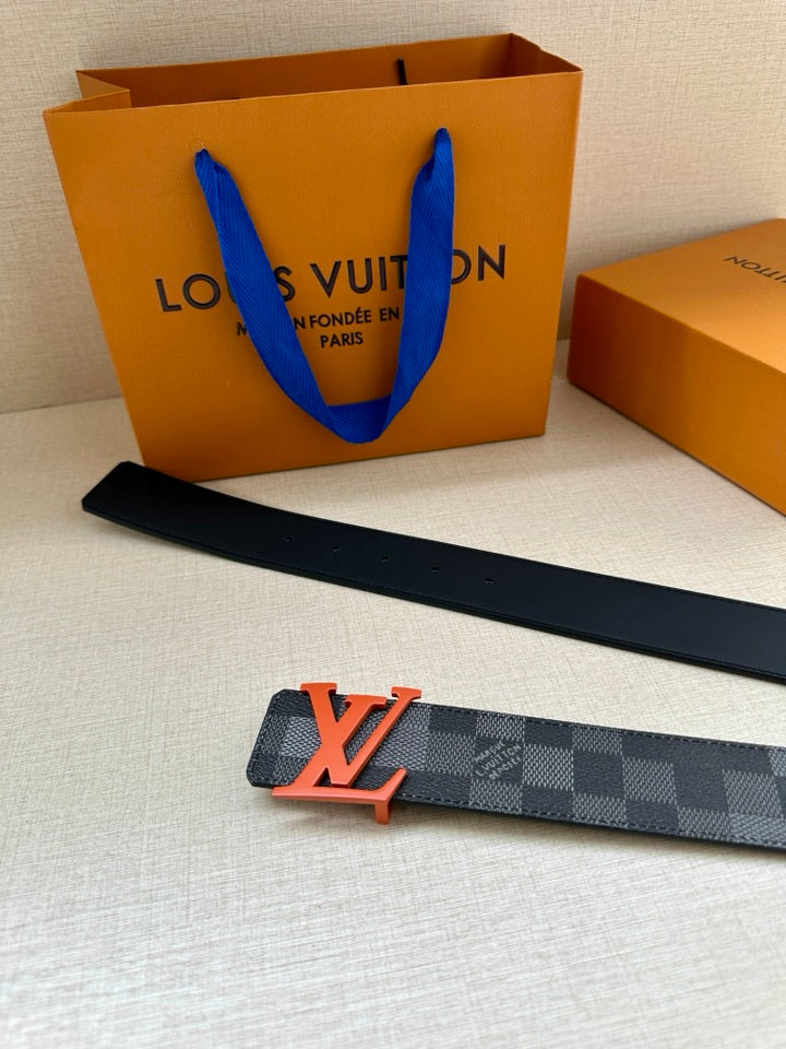 Louis Vuitton long belt with dark checkered strap and orange LV buckle