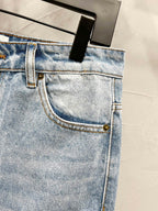 Maison Margiela denim jeans front pocket and fly with light wash and gold button