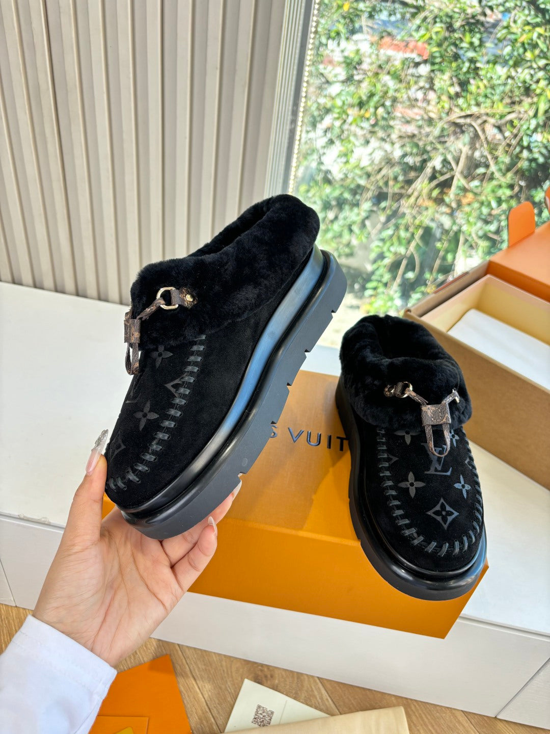 Louis Vuitton unisex black velvet loafer with fur collar, monogram insole, and chunky sole