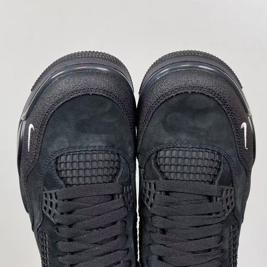 Air Jordan 4 sneakers, dark gray suede with rear mesh cages and lace-up eyelets