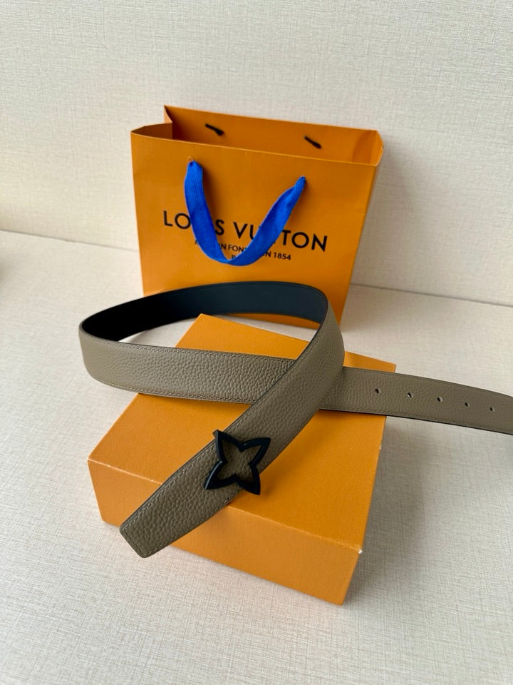 Louis Vuitton belt with light gray textured strap and star buckle
