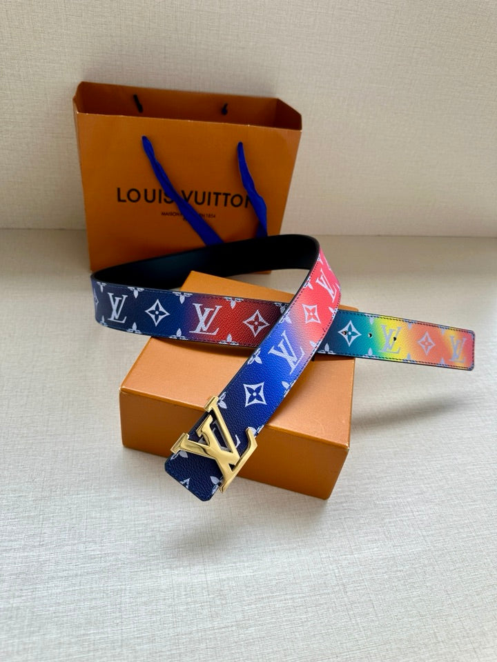 Multicolor monogram belt with gold-tone buckle, blue, red, and rainbow accents