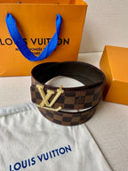 Louis Vuitton Damier check belt with gold V buckle on dark brown strap