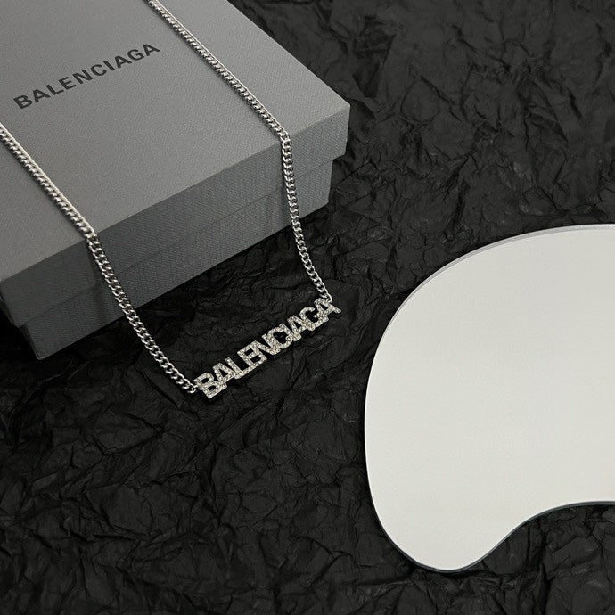 Silver Balenciaga logo pendant necklace with link chain