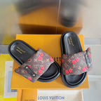 Louis Vuitton slide sandals, dark canvas straps with red cherry motif and black footbed