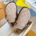 Monogram slide sandals with adjustable strap and gold buckle, beige.