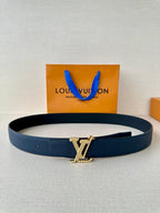 Louis Vuitton leather belt in dark blue with gold-tone monogram buckle, center view