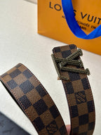 Louis Vuitton belt end: wide checkered strap with rhinestone V buckle