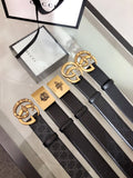 Gucci belt with black leather strap and gold interlocking G buckle