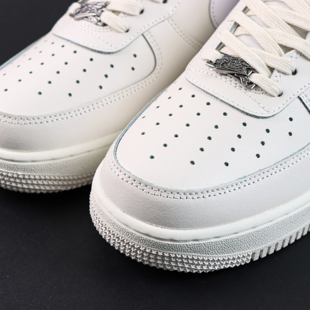 White Air Force 1 toe cap with perforations, lace eyelets, and textured overlay