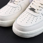 White Air Force 1 toe cap with perforations, lace eyelets, and textured overlay
