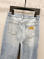 Maison Margiela denim jeans back view, light wash with two pockets and yellow logo label