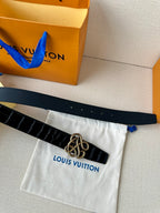 Dark navy croc belt with silver interlaced buckle and row of sizing holes