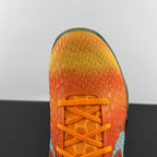 Orange basketball shoe toe with orange laces and textured outsole tread
