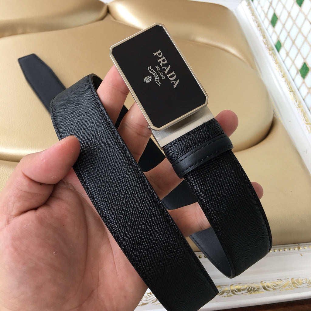 Black textured leather belt with Prada logo plaque buckle, full strap view