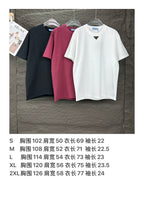 Prada short-sleeve T-shirts in white, black, and maroon