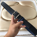 Two-tone belt with textured strap and silver double-prong buckle, blue and black