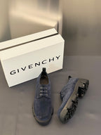 Navy suede lace-up shoes with lace front and stacked outsole heel