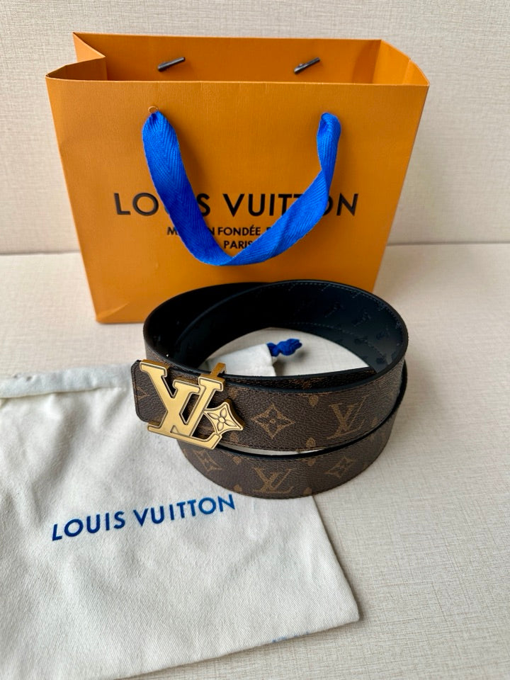 Louis Vuitton monogram belt on pouch, dark strap with gold logo buckle