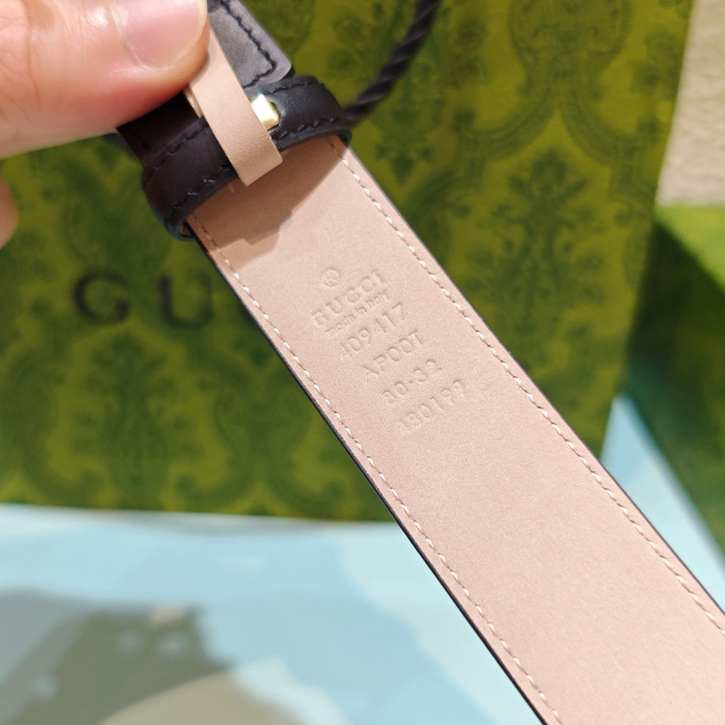 Gucci belt inner leather with embossed markings on light pink strap