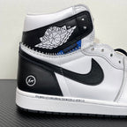White and black high-top sneakers with black collar patch, blue accent, and Nike Swoosh