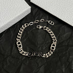 Silver-tone DIOR link bracelet in round layout, engraved DIOR oval charms