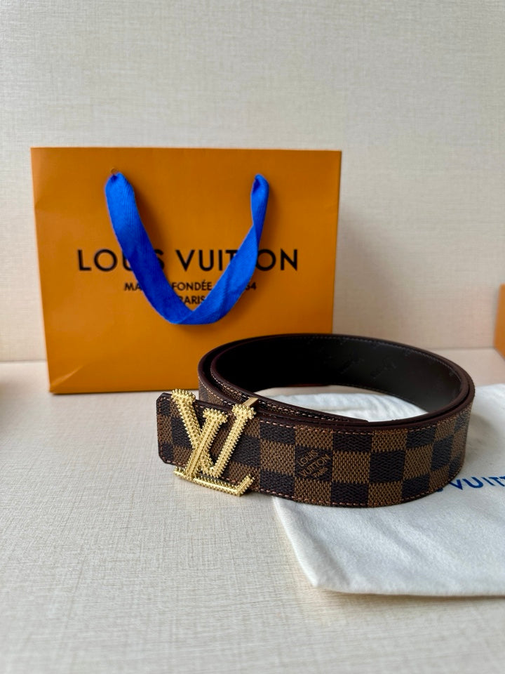 Louis Vuitton Damier check belt with silver V buckle on dark brown strap