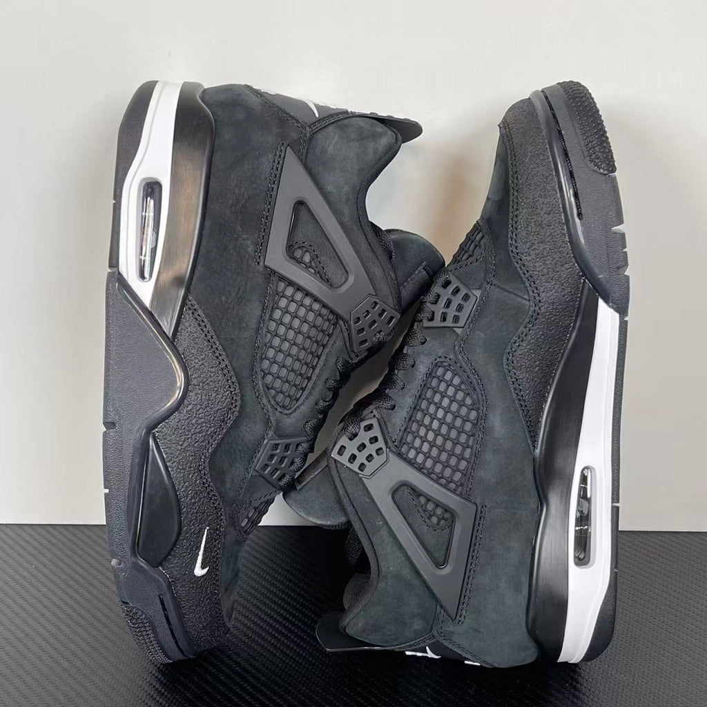 Air Jordan 4 sneakers, dark gray suede with side Air window and rounded heel