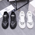 Versace luxury shoes, black and white logo lace-up sneakers with chunky sole
