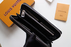 Dark textured leather zip wallet open view showing interior slots and zipper